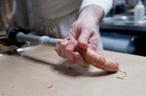 Butcher making a sausage